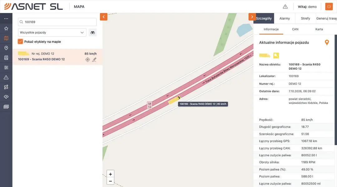 Ekran Mapa w aplikacji: ciężarówka jadąca 85 km/h drogą ekspresową z etykietą na mapie i panel szczegółów z prędkością, przebiegiem i paliwem